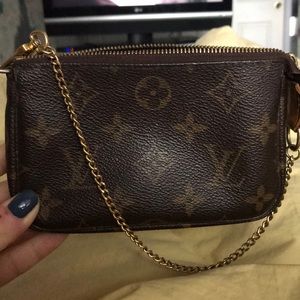 Louis Vuitton canvas clutch